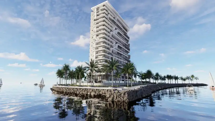 The Icon Tower on the waterfront with the sea around it