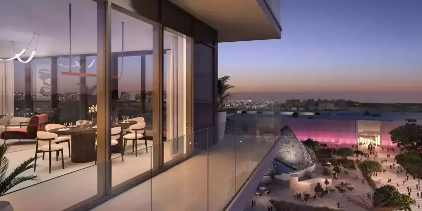 Manarat Living balcony seating overlooking the neighbourhood at dusk
