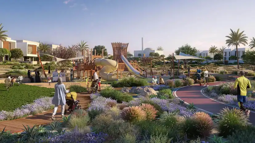 Village playground and landscaped park with a cycling path