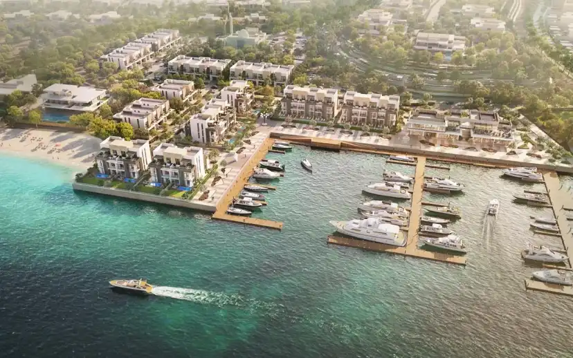 Aerial view of the Marfaa Al Jubail marina with yachts and waterfront buildings