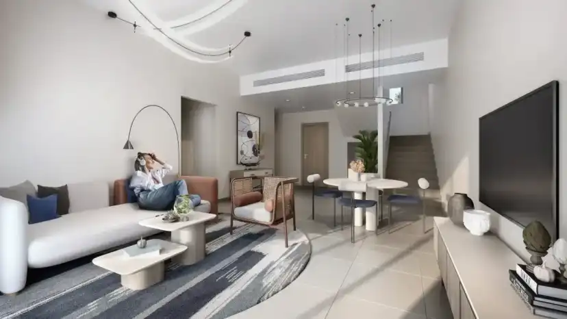 Yas Park Gate open living and dining layout with darker finishes