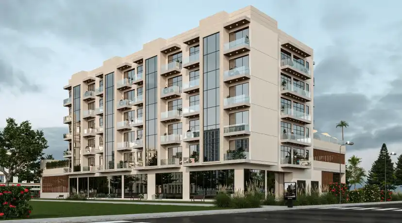 Reeman Residences exterior with stacked balconies and landscaped entrance