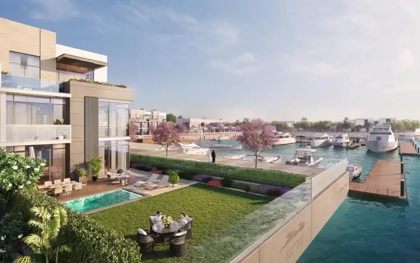 Waterfront villa with a terrace, a pool and a view of the marina