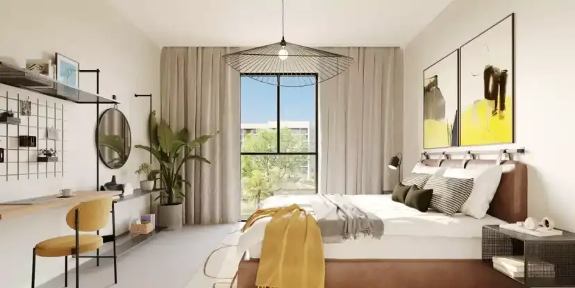 Reeman Living bedroom with warm yellow wall accents