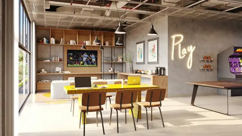 Reeman Living shared games room with yellow tables