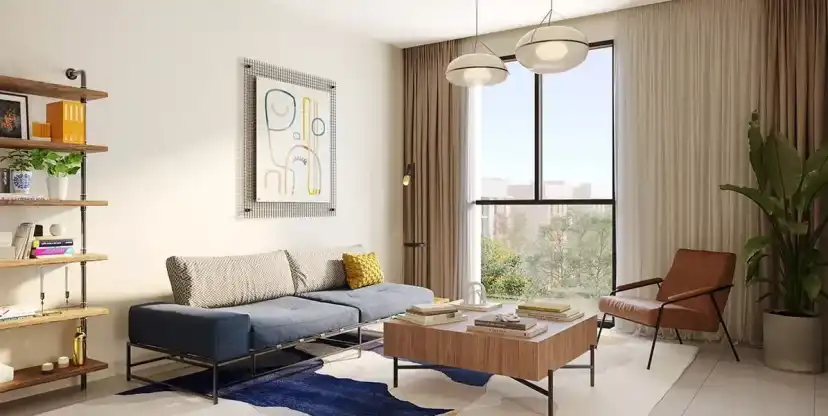 Reeman Living interior with dark blue seating and a dining table