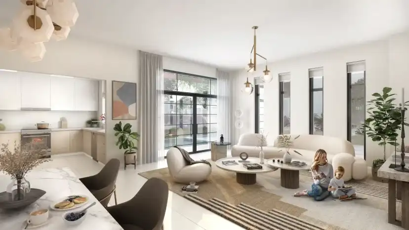 Yas Park Gate living and dining room opening to garden greenery