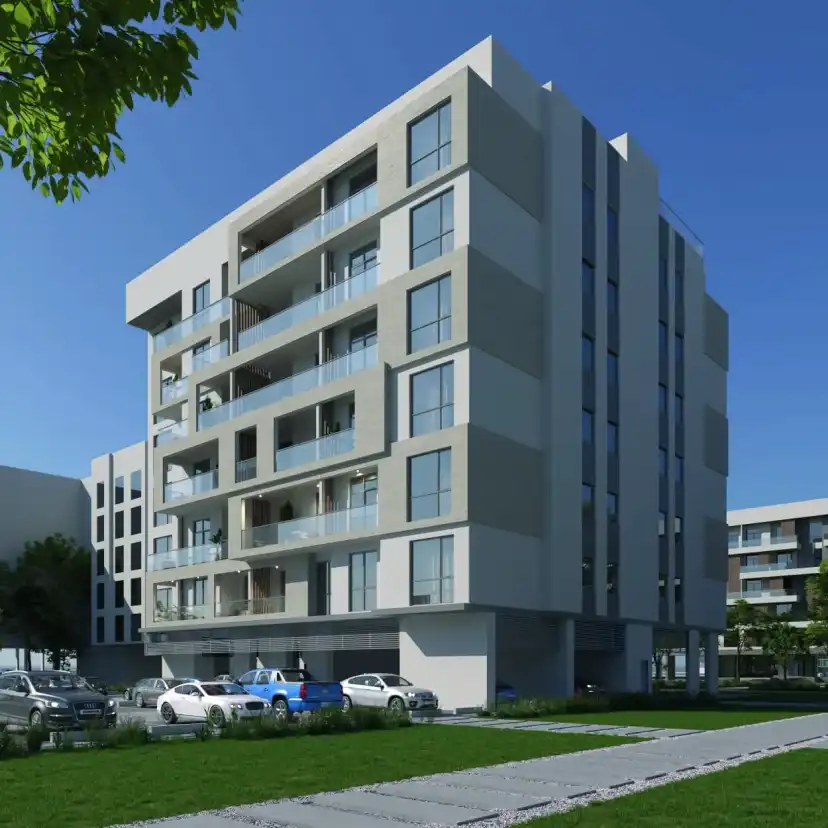 Render of the six floor ICONA Residence with balconies and a lawn at the entrance