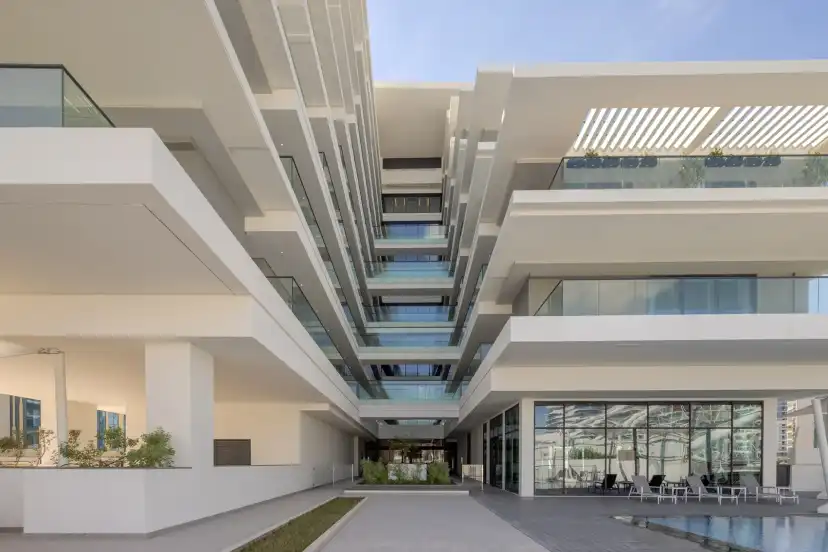 Open court between the terraces with the pool beyond