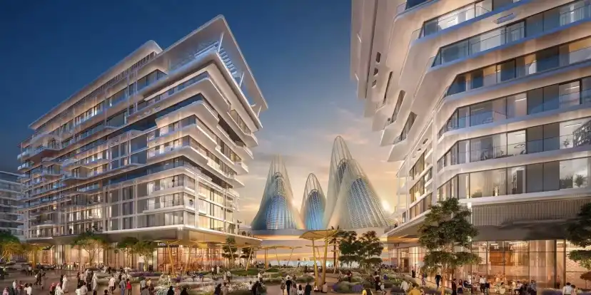 The Source illuminated façades facing Saadiyat Cultural District at dusk