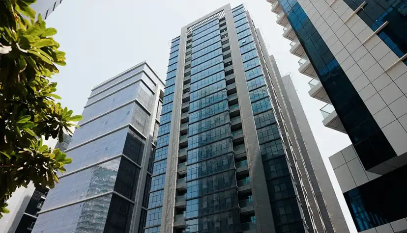 Glass facade of AK Tower seen from below