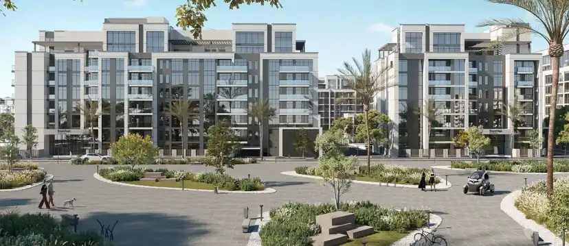 Plaza with planting beds in front of the apartment buildings