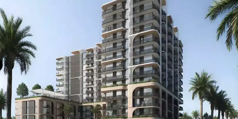 Manarat Living II exterior with curved balconies and planted terraces