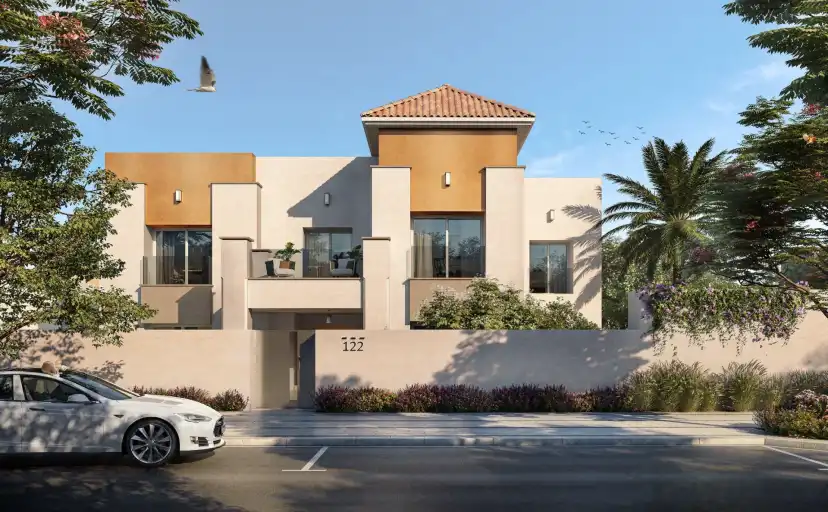 Villa with ochre accent panels and a tiled roof