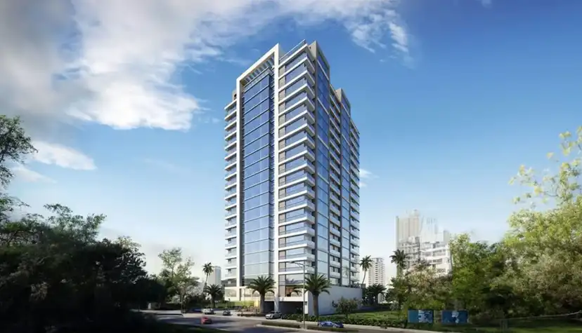 AK Tower rising above the trees on Muroor Road