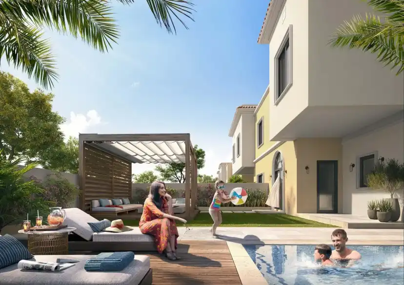 Yas Park Gate landscaped outdoor pool area beside community homes