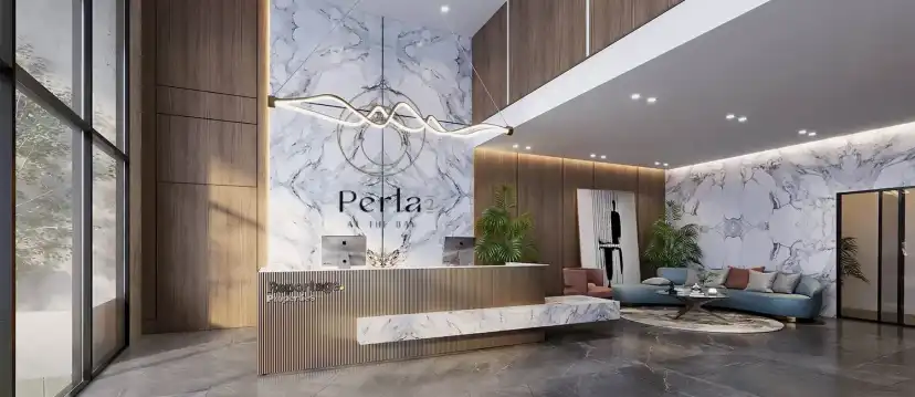Lobby with a marble wall and a reception desk